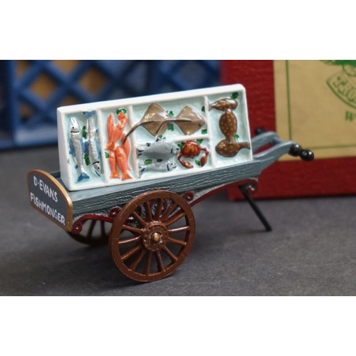 261 - A collection of boxed traditional metal painted figures to include Streets of London shoe shiner, mi... 