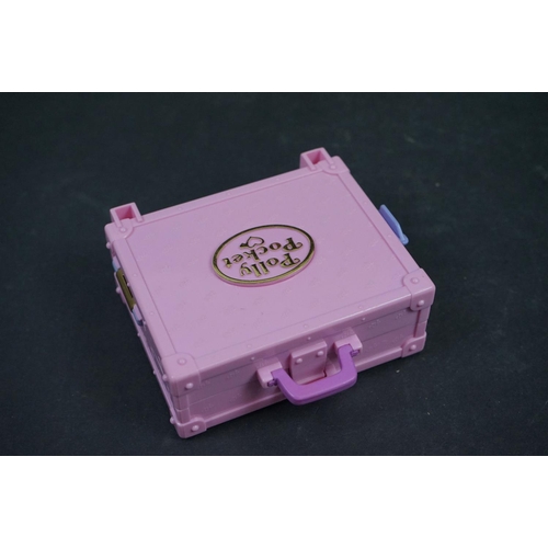 1048 - Seven Bluebird Polly Pocket playsets and figures to include Precious Puppies, Boutique Suitcase, etc... 