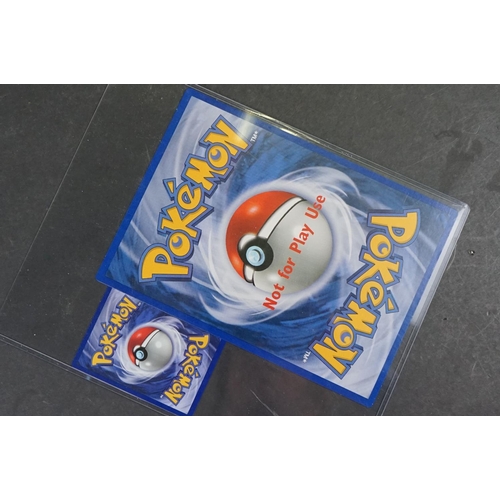 1054 - Collection of sealed Pokemon trading cards and related collectables to include 2-Player Starter Set,... 