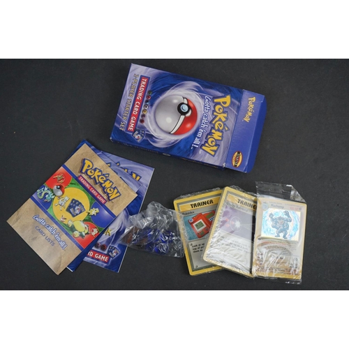 1054 - Collection of sealed Pokemon trading cards and related collectables to include 2-Player Starter Set,... 