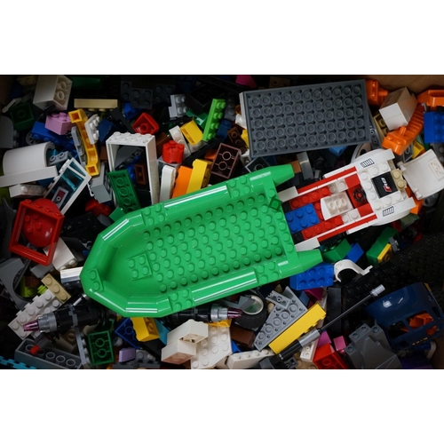 1064 - Two boxes of loose Lego pieces and mini figures