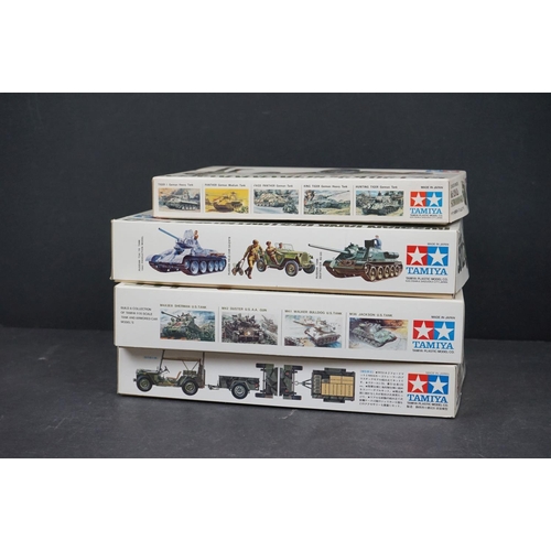 1081 - Four boxed Tamiya 1:35 scale plastic model kits to include 35003-350 German Amphibious Volkswagen Je... 