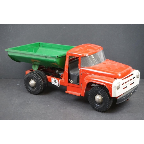 1087 - Circa 1970s metal Tipping Truck with red cab and chassis, green tipper, showing play wear, 21