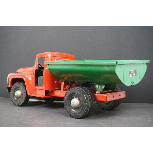 1087 - Circa 1970s metal Tipping Truck with red cab and chassis, green tipper, showing play wear, 21