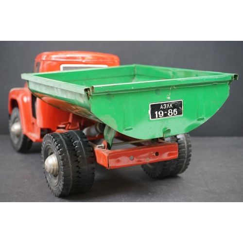 1087 - Circa 1970s metal Tipping Truck with red cab and chassis, green tipper, showing play wear, 21