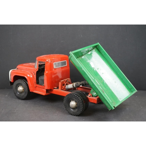 1087 - Circa 1970s metal Tipping Truck with red cab and chassis, green tipper, showing play wear, 21