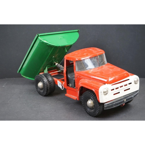 1087 - Circa 1970s metal Tipping Truck with red cab and chassis, green tipper, showing play wear, 21