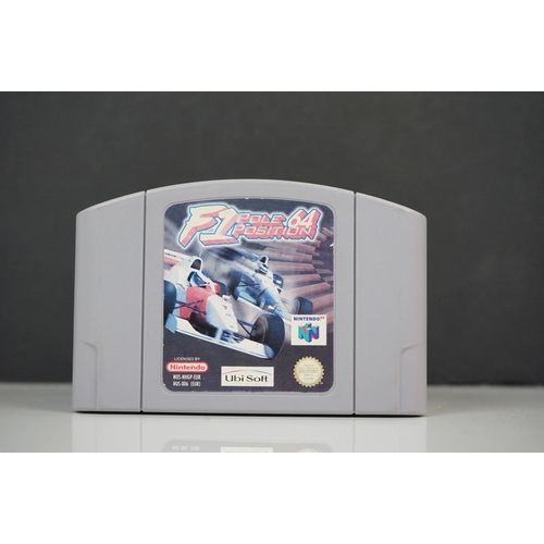 1088 - Retro Gaming - Four Nintendo 64 N64 cartridges featuring F1 Pole Position 64, F-1 World Grand Prix, ... 