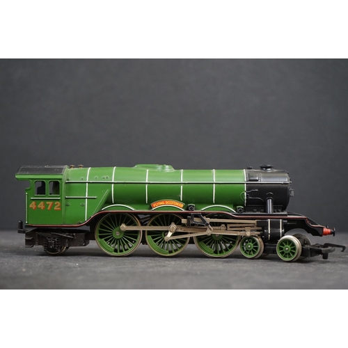 115 - Three OO gauge locomotives to include Triang R651 Stephenson's Rocket plus 2 x Triang Hornby locomot... 