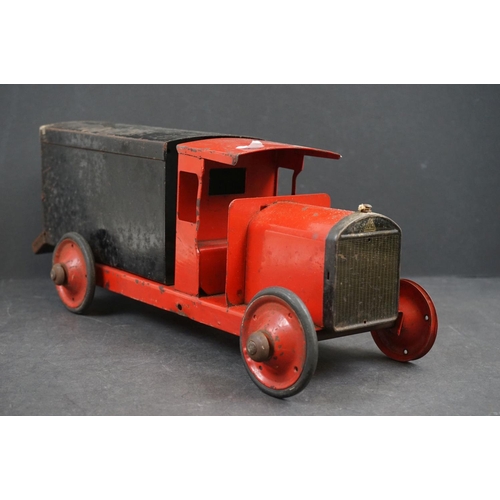 282 - Four early/mid 20th century tin plate and wooden models to include tin plate Lines Bros wagon in red... 