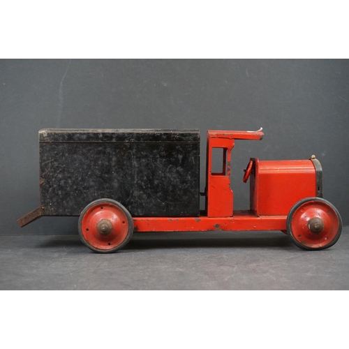 282 - Four early/mid 20th century tin plate and wooden models to include tin plate Lines Bros wagon in red... 