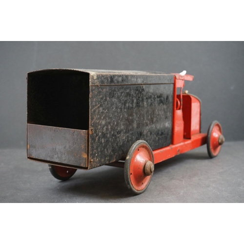 282 - Four early/mid 20th century tin plate and wooden models to include tin plate Lines Bros wagon in red... 