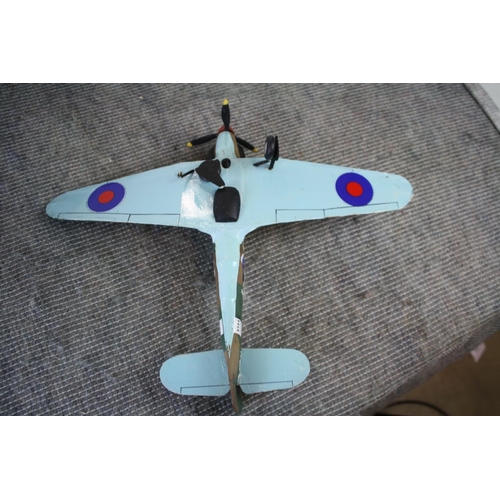 280 - Two kit built world war two model aircraft to include a spitfire and a hurricane, largest measures a... 