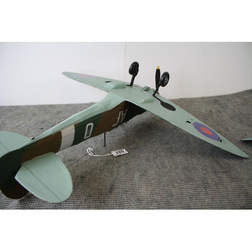 280 - Two kit built world war two model aircraft to include a spitfire and a hurricane, largest measures a... 