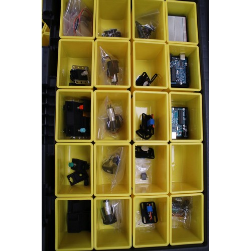 218 - Two plastic containers of Meccano including scarce parts and digital boards and accessories. Part of... 