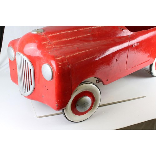 268 - Triang metal pedal car, with metal wheels, has been repainted and is missing windshield, (98cm x 43c... 