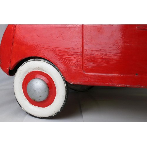 268 - Triang metal pedal car, with metal wheels, has been repainted and is missing windshield, (98cm x 43c... 