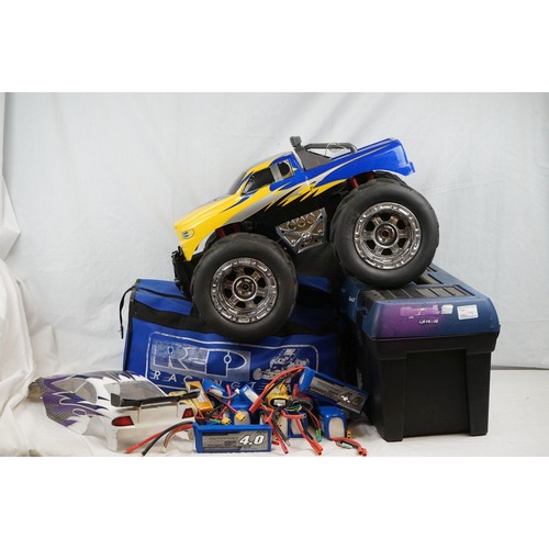 1093 - Two assembled radio control vehicles to include HB Monster Truck, appearing complete with foam wheel... 