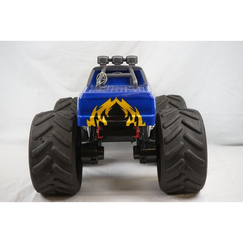 1093 - Two assembled radio control vehicles to include HB Monster Truck, appearing complete with foam wheel... 