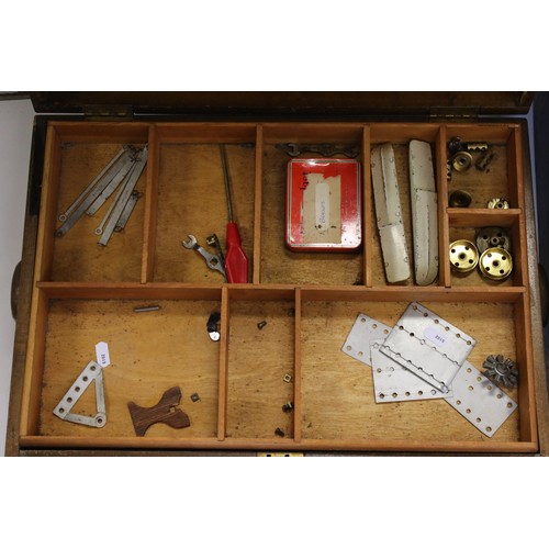 187 - Mid 20th century Meccano wooden box (with key), containing a number of parts, together with a furthe... 