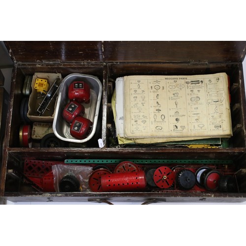 187 - Mid 20th century Meccano wooden box (with key), containing a number of parts, together with a furthe... 