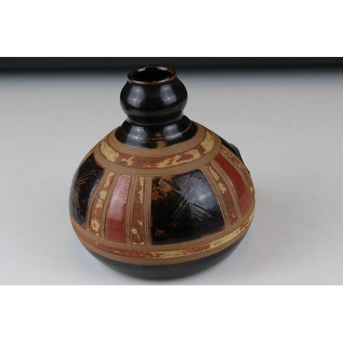 15 - A 20th century David Gatiskell studio pottery onion shaped vase with brown and red glazed panels,14 ... 