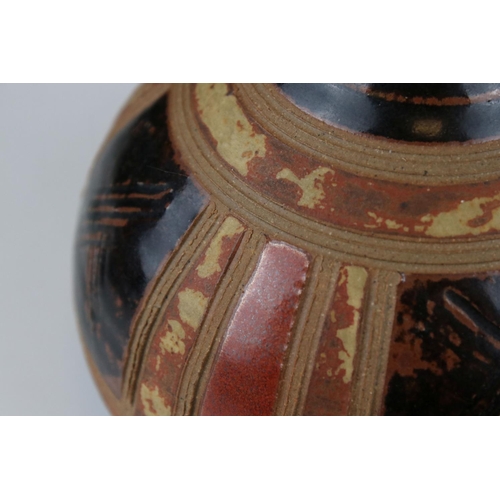 15 - A 20th century David Gatiskell studio pottery onion shaped vase with brown and red glazed panels,14 ... 