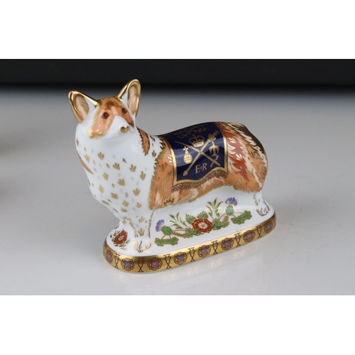 17 - Three Royal Crown Derby limited edition paperweights in the form of the Queens Corgi dogs.
