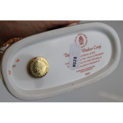 17 - Three Royal Crown Derby limited edition paperweights in the form of the Queens Corgi dogs.