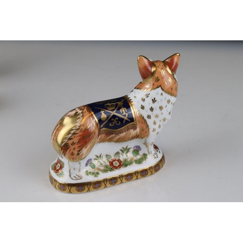 17 - Three Royal Crown Derby limited edition paperweights in the form of the Queens Corgi dogs.