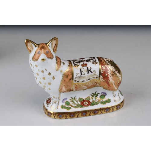 17 - Three Royal Crown Derby limited edition paperweights in the form of the Queens Corgi dogs.