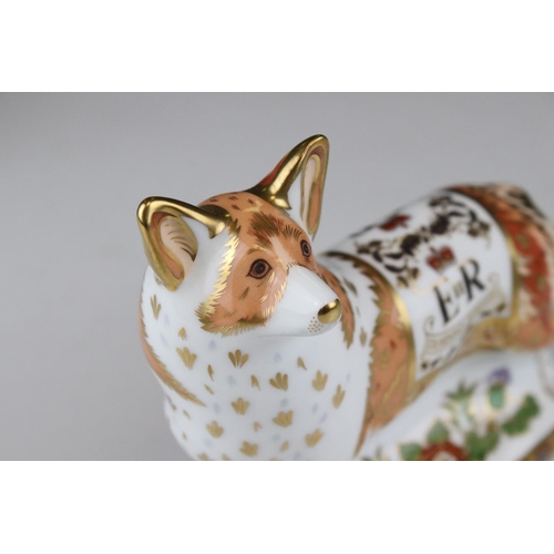 17 - Three Royal Crown Derby limited edition paperweights in the form of the Queens Corgi dogs.