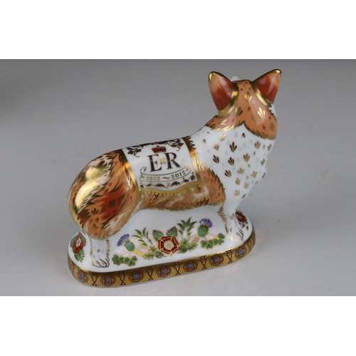 17 - Three Royal Crown Derby limited edition paperweights in the form of the Queens Corgi dogs.