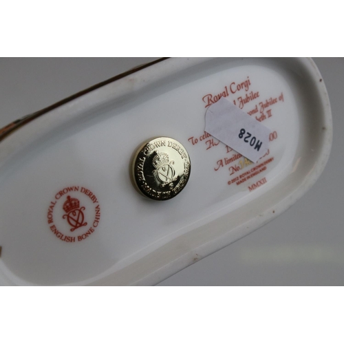 17 - Three Royal Crown Derby limited edition paperweights in the form of the Queens Corgi dogs.