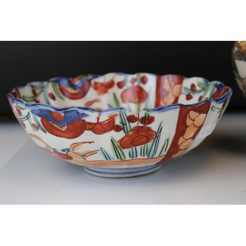 37 - A group of Japanese ceramics to include Satsuma Moon Flask, similar vase, a scalloped edged bowl etc... 