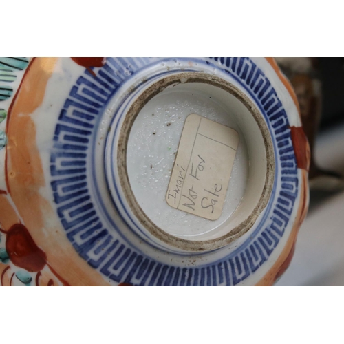 37 - A group of Japanese ceramics to include Satsuma Moon Flask, similar vase, a scalloped edged bowl etc... 