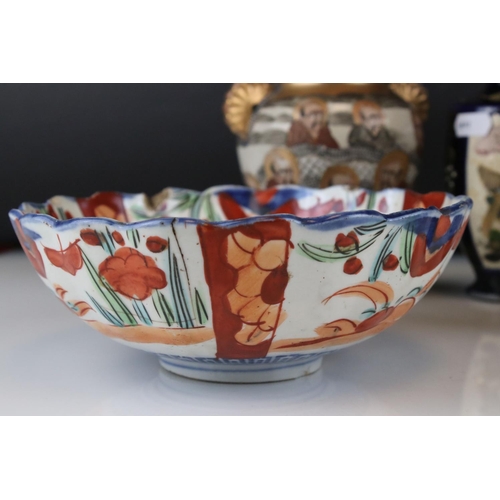 37 - A group of Japanese ceramics to include Satsuma Moon Flask, similar vase, a scalloped edged bowl etc... 