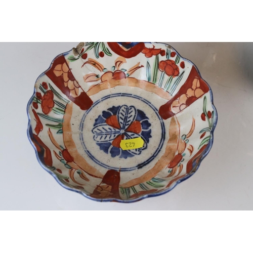 37 - A group of Japanese ceramics to include Satsuma Moon Flask, similar vase, a scalloped edged bowl etc... 
