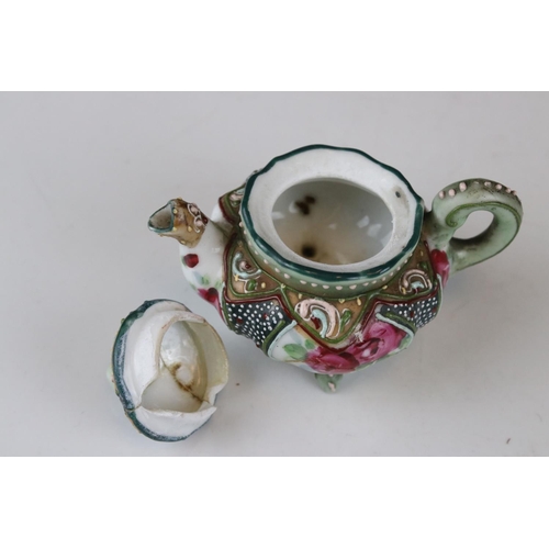 37 - A group of Japanese ceramics to include Satsuma Moon Flask, similar vase, a scalloped edged bowl etc... 