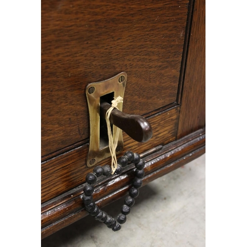 38 - An early 20th century oak cased Gledhill Brook Time Recorder clocking in clock together with a wall ... 