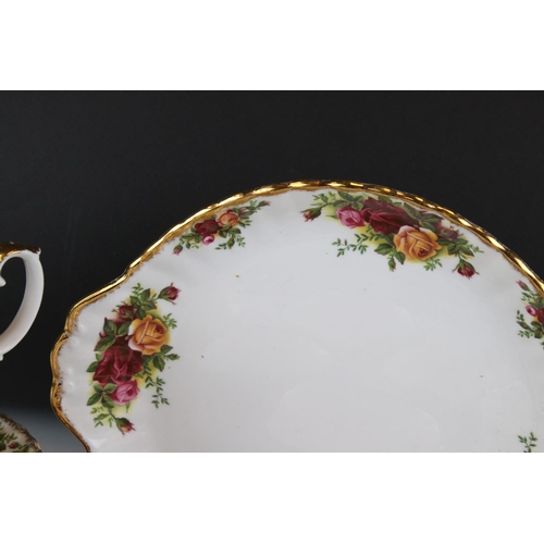 44 - A Country Roses Royal Albert part tea set to include trios, jug, bowl, cake plate etc.