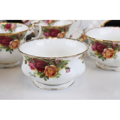 44 - A Country Roses Royal Albert part tea set to include trios, jug, bowl, cake plate etc.