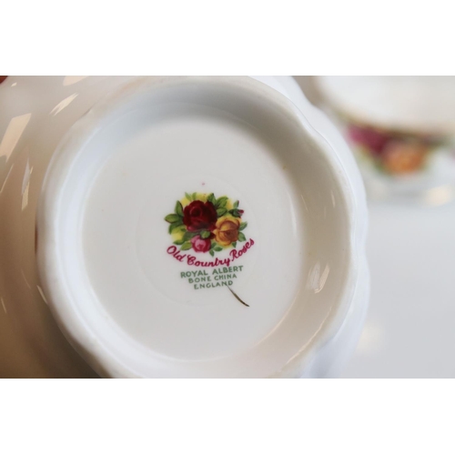 44 - A Country Roses Royal Albert part tea set to include trios, jug, bowl, cake plate etc.