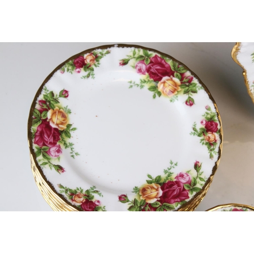 44 - A Country Roses Royal Albert part tea set to include trios, jug, bowl, cake plate etc.