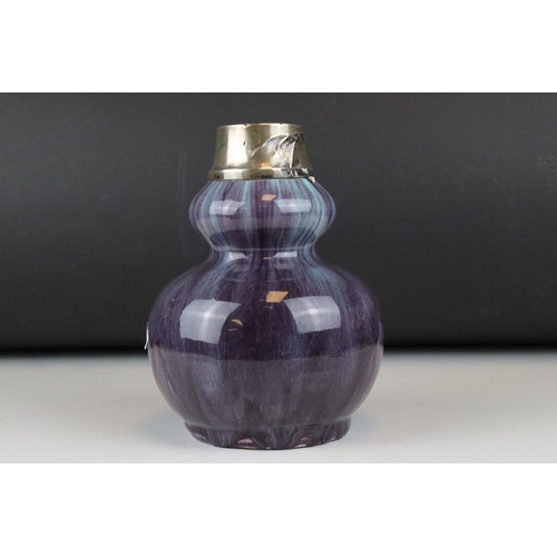 6 - Early 20th century Double gourd purple flambe ground ceramic vase with silver top, being a later emb... 