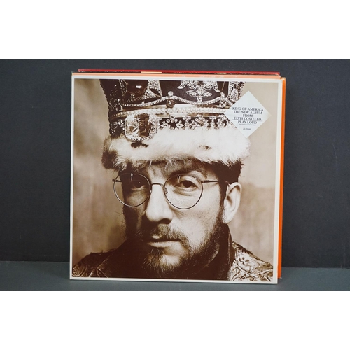 1282 - Vinyl - 13 Elvis Costello LPs to include and instore album white label sampler.  LPs include Girls G... 