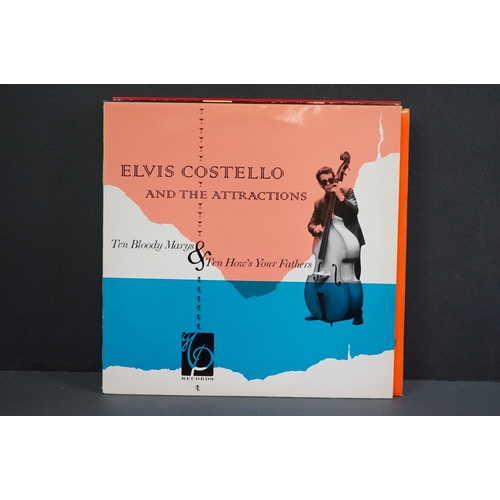 1282 - Vinyl - 13 Elvis Costello LPs to include and instore album white label sampler.  LPs include Girls G... 