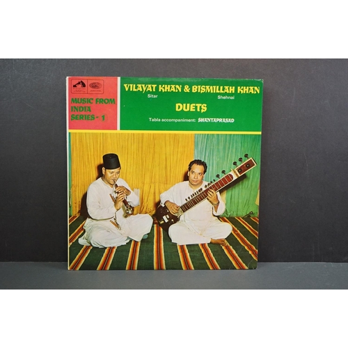 1345 - Vinyl - World Music - Around 15 LPs to include Mary Kante, Ravi Shangkar etc, sleeves and vinyl vary