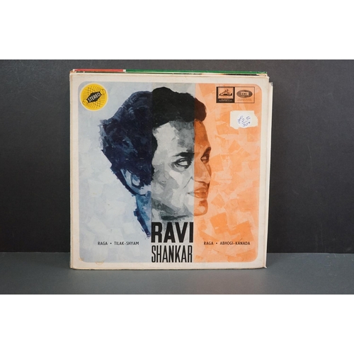 1345 - Vinyl - World Music - Around 15 LPs to include Mary Kante, Ravi Shangkar etc, sleeves and vinyl vary