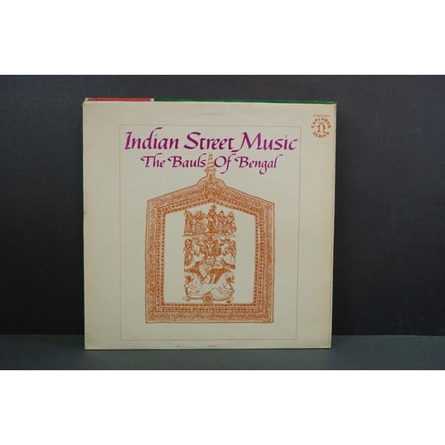 1345 - Vinyl - World Music - Around 15 LPs to include Mary Kante, Ravi Shangkar etc, sleeves and vinyl vary